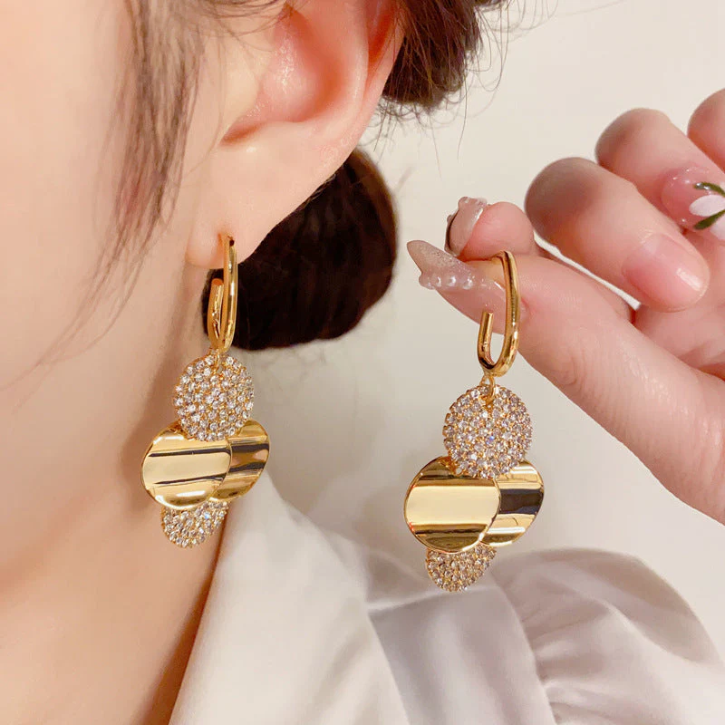Crystal Radiance Round Tassel Earrings - Image 1