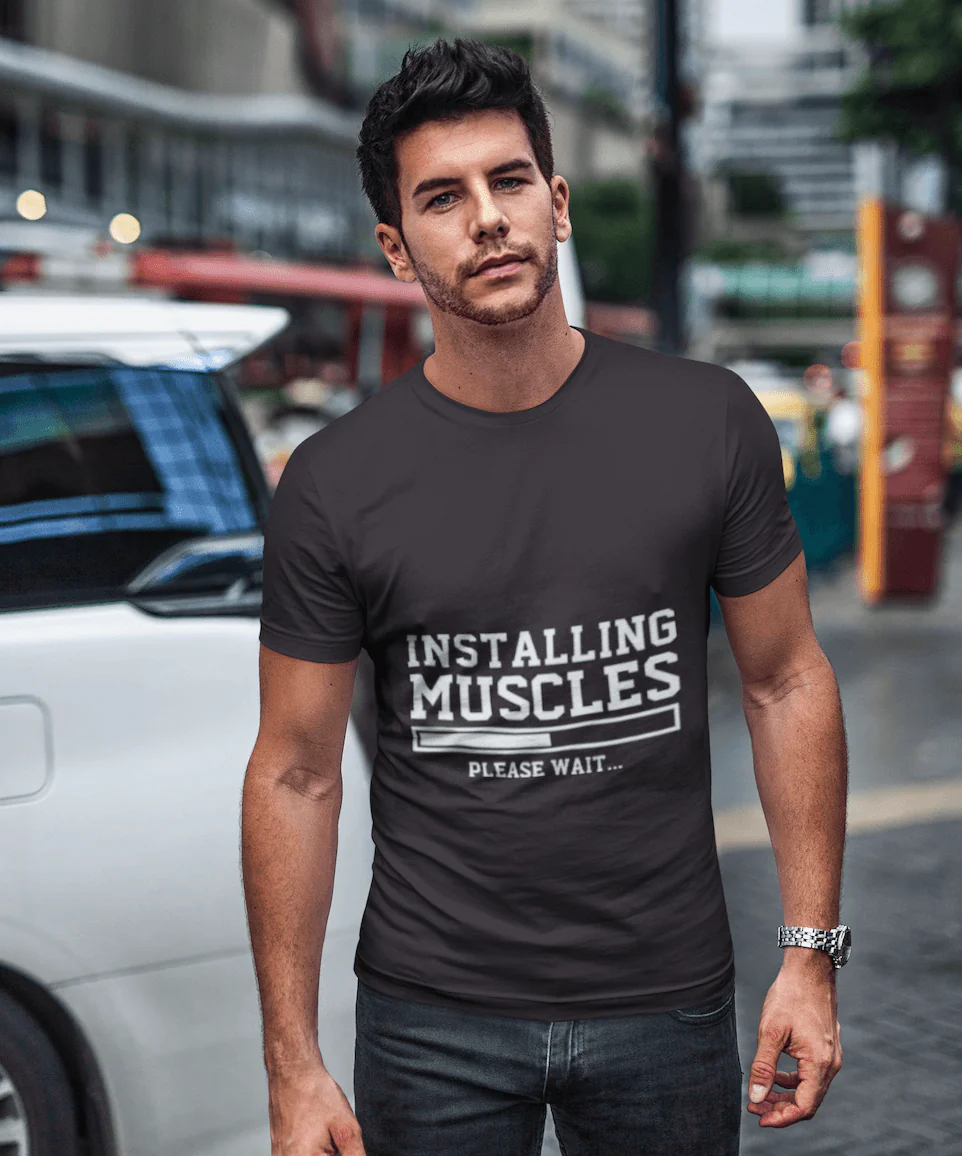 Installing Muscles Funny T-shirt - Image 1