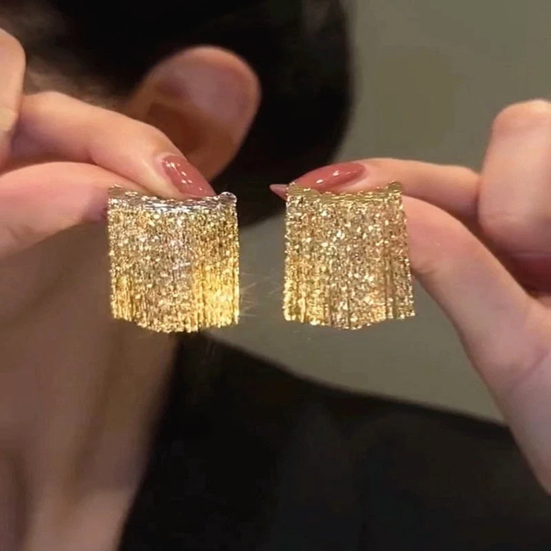 Golden Shining City Tassel Earring - Image 1