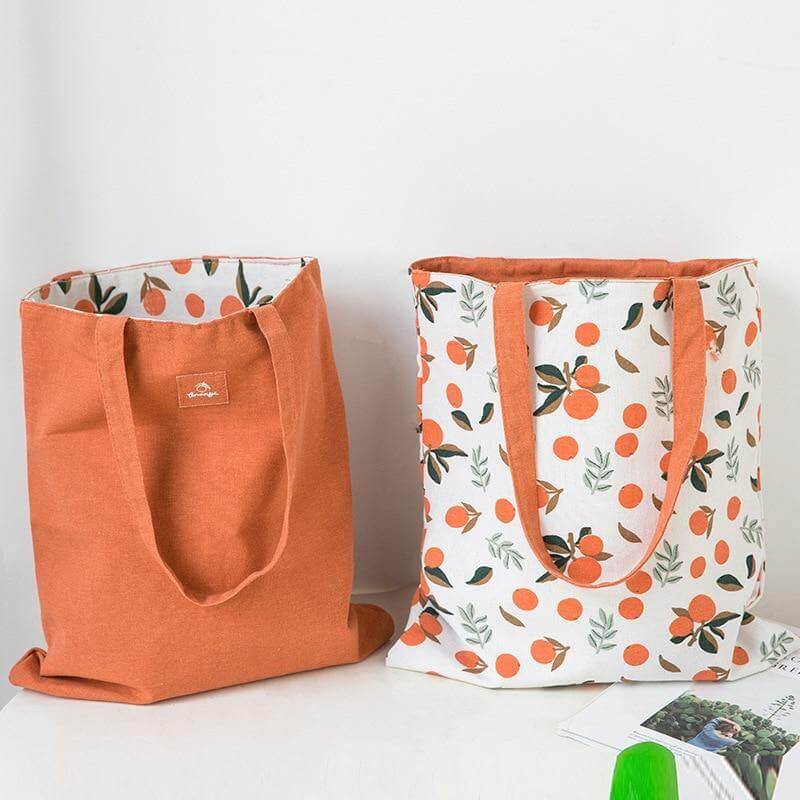 Stylish Double Sided Clementine Hand Bag - Image 1